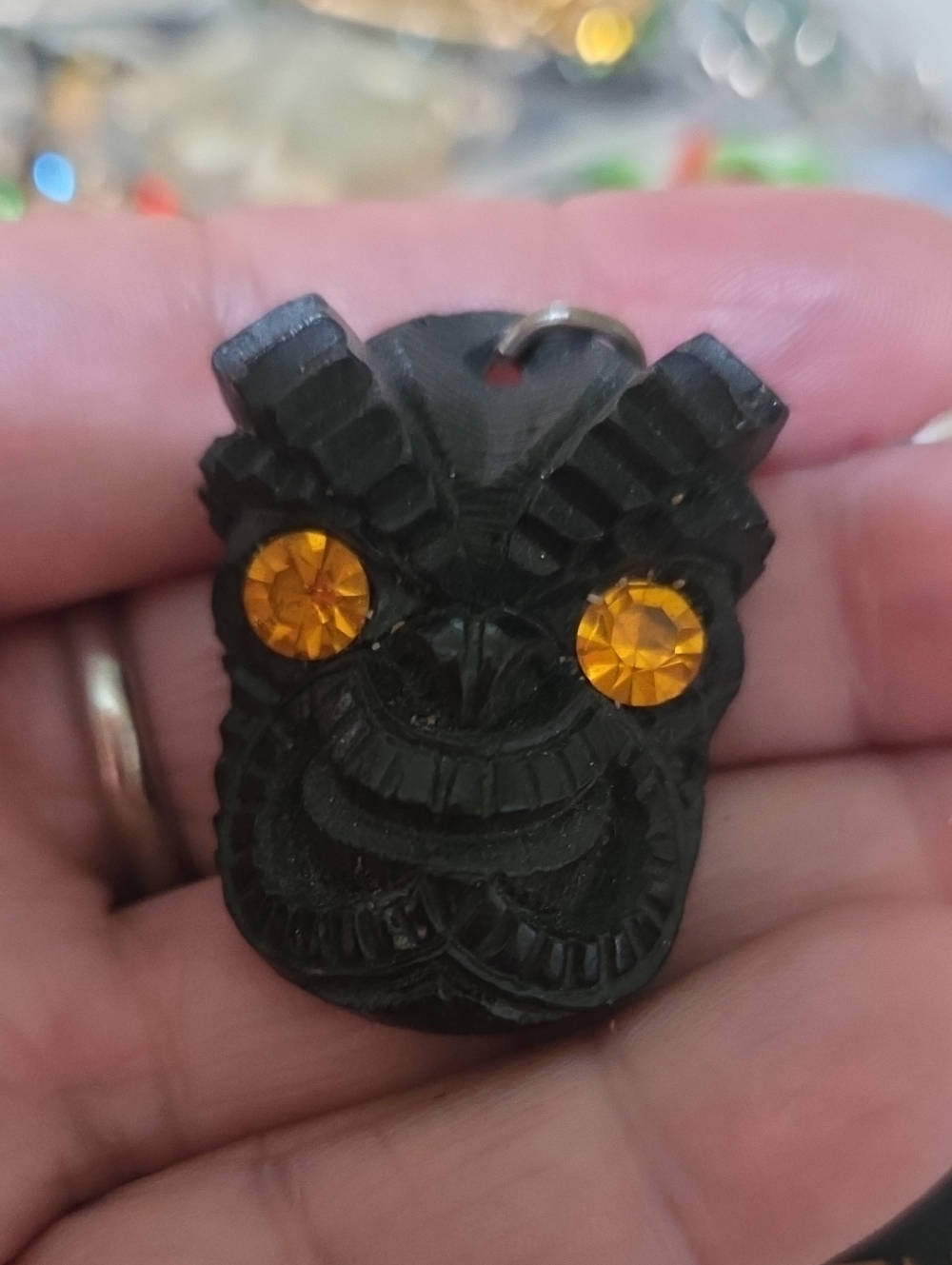 Black Carved Lava Tiki Pendant with Amber Eyes